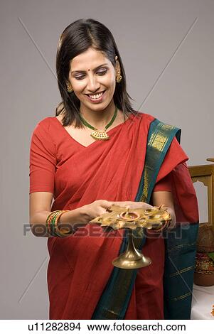 A woman praying View Large Photo Image Picture - A woman praying. Fotosearch