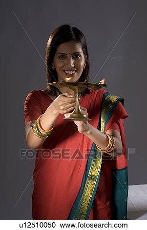 A woman praying View Large Photo Image Stock Image - A woman praying. Fotosearch