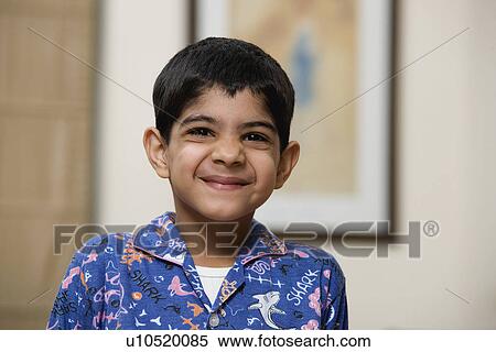 A young boy smiling View Large Photo Image Stock Photography - A young boy smiling. Fotosearch