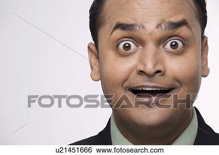 Stock Photograph - An excited executive. Fotosearch