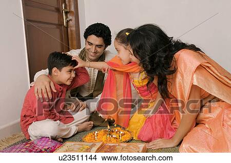 Picture - Applying tika. Fotosearch