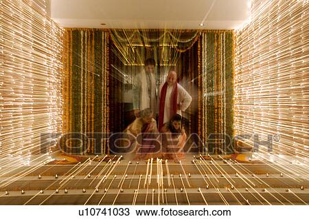 Arranging diyas on the floor View Large Photo Image Stock Image - Arranging diyas on the floor. Fotosearch