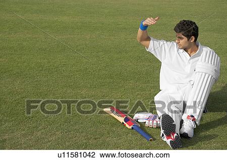 Stock Image - Batsman relaxing. Fotosearch