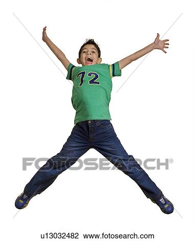 Boy jumping with joy View Large Photo Image Stock Image - Boy jumping with joy. Fotosearch
