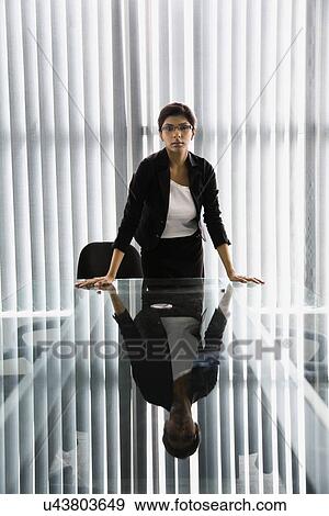 Stock Photo - Business executive standing. Fotosearch