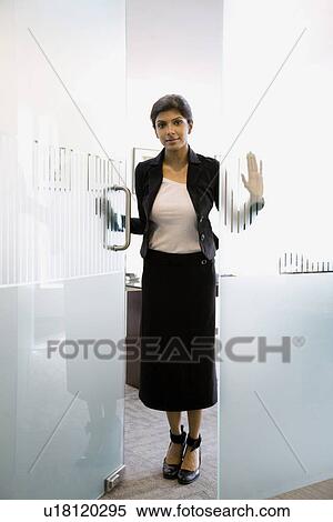 Stock Photography - Business executive standing. Fotosearch