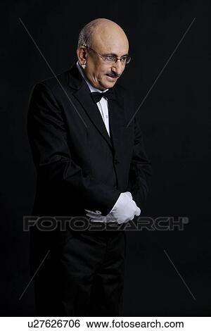 Stock Photograph - Butler standing. Fotosearch
