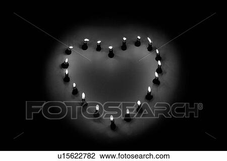 Candles arranged in shape of a heart View Large Photo Image Stock Image - Candles arranged in shape of a heart. Fotosearch
