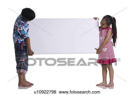 Children holding a whiteboard View Large Photo Image Stock Photo - Children holding a whiteboard. Fotosearch