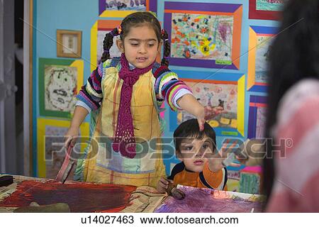 Stock Image - Children in the art room. Fotosearch