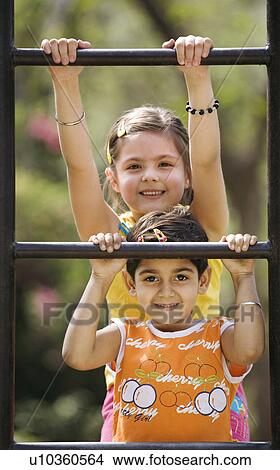 Picture - Children on monkey bars. Fotosearch