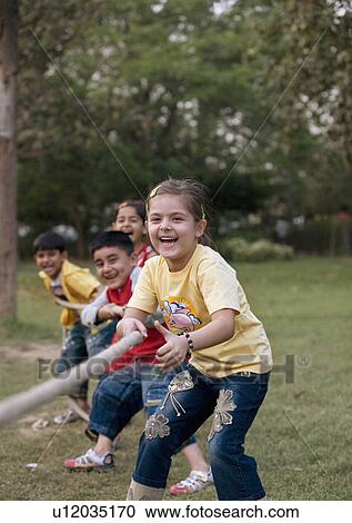 Children pulling a rope View Large Photo Image Stock Image - Children pulling a rope. Fotosearch