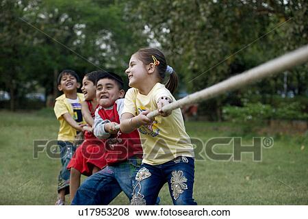 Children pulling a rope View Large Photo Image Stock Photo - Children pulling a rope. Fotosearch