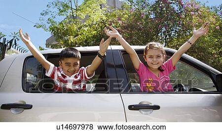 Children raising their arms View Large Photo Image Stock Photo - Children raising their arms. Fotosearch