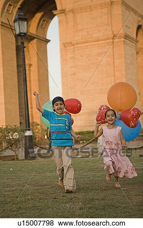Stock Photo - Children running. Fotosearch