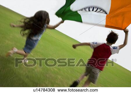 Children running with the Indian Flag View Large Photo Image Stock Photo - Children running with the Indian Flag. Fotosearch