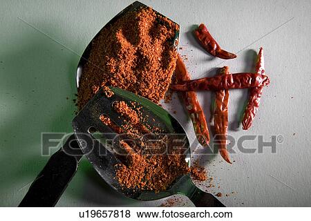 Stock Photo - Chili powder with red chili. Fotosearch