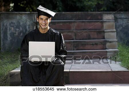 Stock Photography - College student at graduation ceremony. Fotosearch