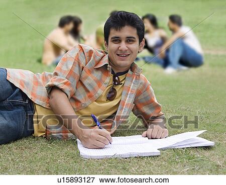 College student taking notes View Large Photo Image Stock Photo - College student taking notes. Fotosearch