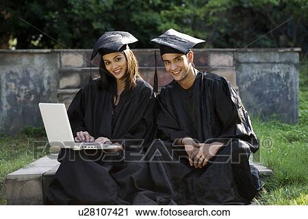 College students at graduation ceremony View Large Photo Image Stock Image - College students at graduation ceremony. Fotosearch