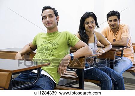 College students in a classroom View Large Photo Image Stock Photo - College students in a classroom. Fotosearch