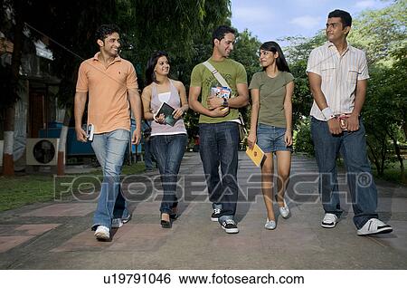 Stock Photograph - College students walking together. Fotosearch