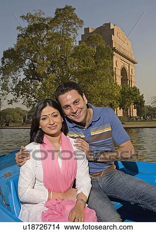 Picture - Couple enjoying boating. Fotosearch