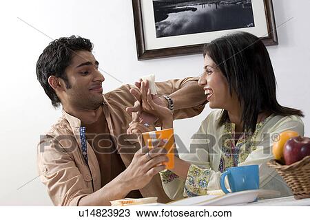 Couple having breakfast View Large Photo Image Stock Image - Couple having breakfast. Fotosearch