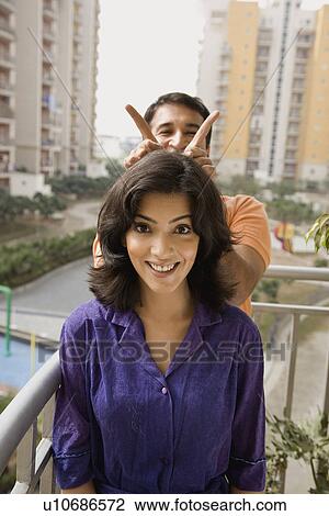 Couple having fun View Large Photo Image Stock Image - Couple having fun. Fotosearch