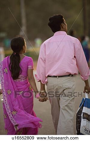 Couple holding hands View Large Photo Image Stock Photo - Couple holding hands. Fotosearch