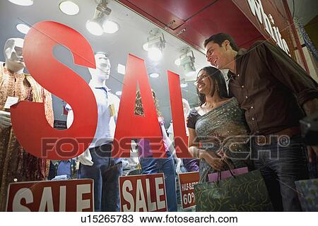 Stock Image - Couple shopping. Fotosearch