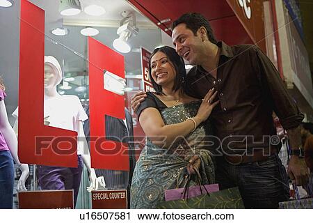 Stock Image - Couple shopping. Fotosearch