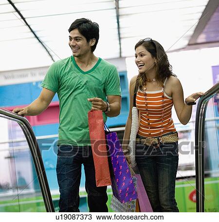 Stock Image - Couple shopping. Fotosearch