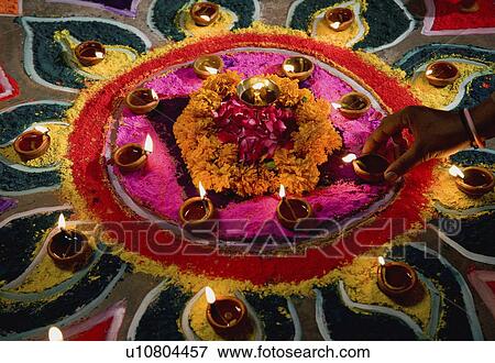Stock Photo - Diya with Rangoli. Fotosearch