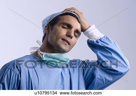 Doctor after surgery View Large Photo Image Picture - Doctor after surgery. Fotosearch