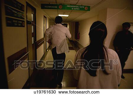 Stock Image - Doctors in a rush. Fotosearch