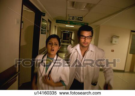 Stock Photography - Doctors in a rush. Fotosearch