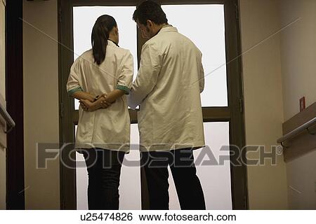Doctors in consultation View Large Photo Image Stock Photograph - Doctors in consultation. Fotosearch