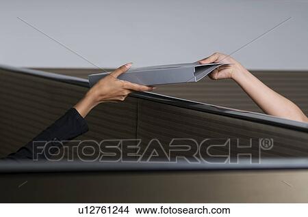 Picture - Exchanging a file. Fotosearch