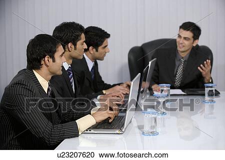 Executive at work View Large Photo Image Stock Image - Executive at work. Fotosearch