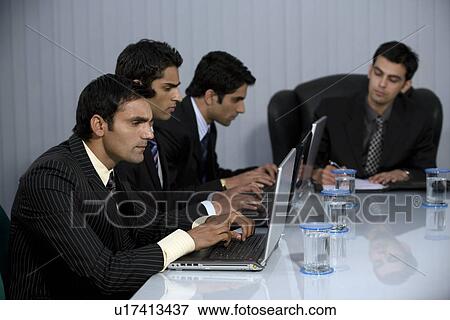 Executive at work View Large Photo Image Stock Photo - Executive at work. Fotosearch