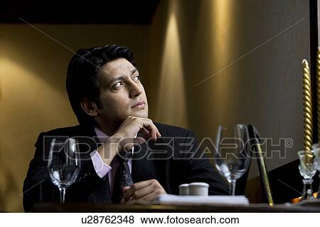 Stock Photo - Executive in deep thought. Fotosearch