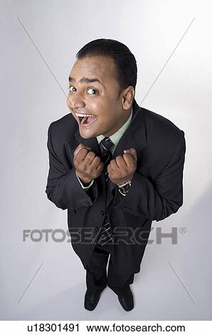 Executive in playful mood View Large Photo Image Stock Image - Executive in playful mood. Fotosearch