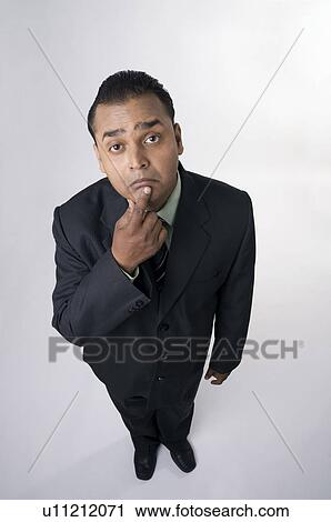 Executive thinking View Large Photo Image Stock Image - Executive thinking. Fotosearch