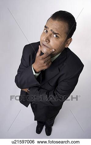 Executive thinking View Large Photo Image Stock Photograph - Executive thinking. Fotosearch