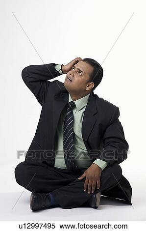 Executive wondering View Large Photo Image Stock Photography - Executive wondering. Fotosearch