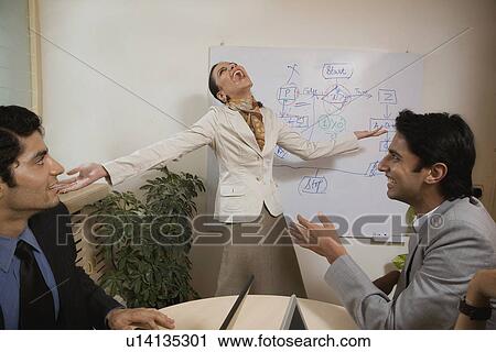 Executives at a meeting View Large Photo Image Stock Image - Executives at a meeting. Fotosearch