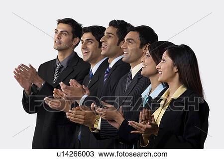 Stock Image - Executives clapping. Fotosearch