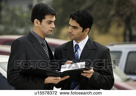 Executives having a discussion View Large Photo Image Stock Image - Executives having a discussion. Fotosearch