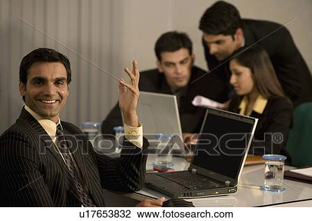 Executives in a meeting View Large Photo Image Stock Image - Executives in a meeting . Fotosearch
